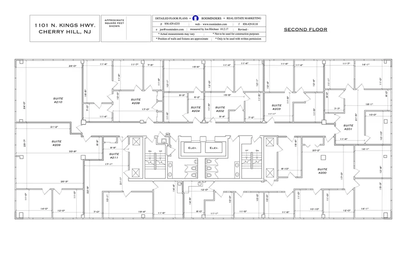 Full second-floor office building plan showing all suites, elevators and restrooms